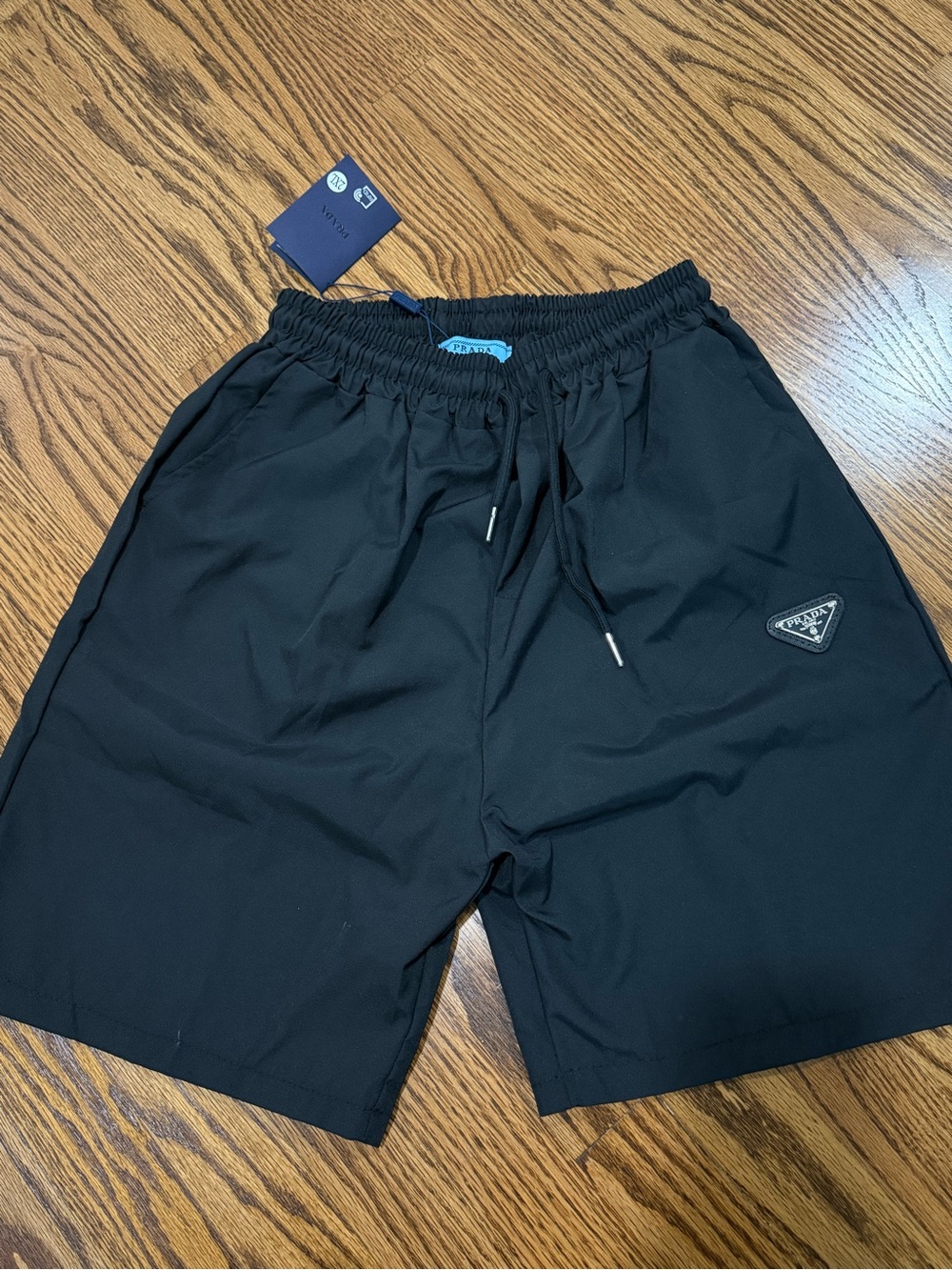 Prada Black Men’s Swim Trunks with Triangle Logo